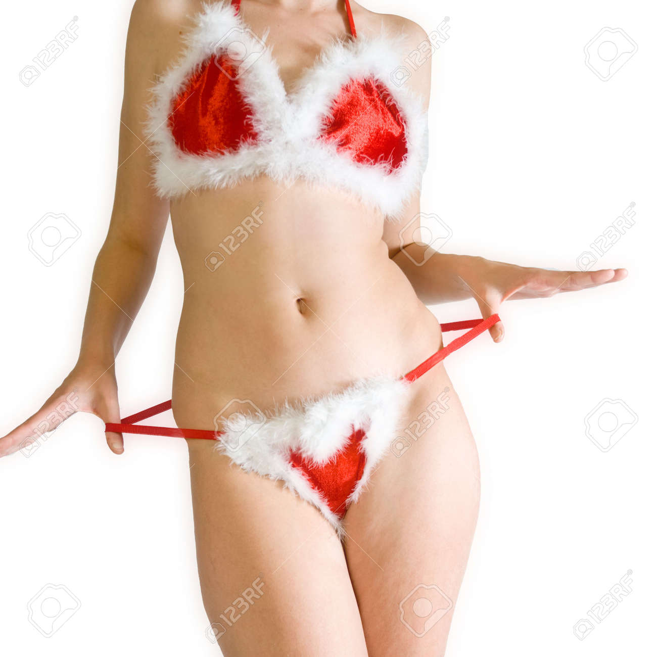 Sexy Young Woman Stripping Out Of Her Christmas Bikini Stock Photo, Picture  and Royalty Free Image. Image 2108768.
