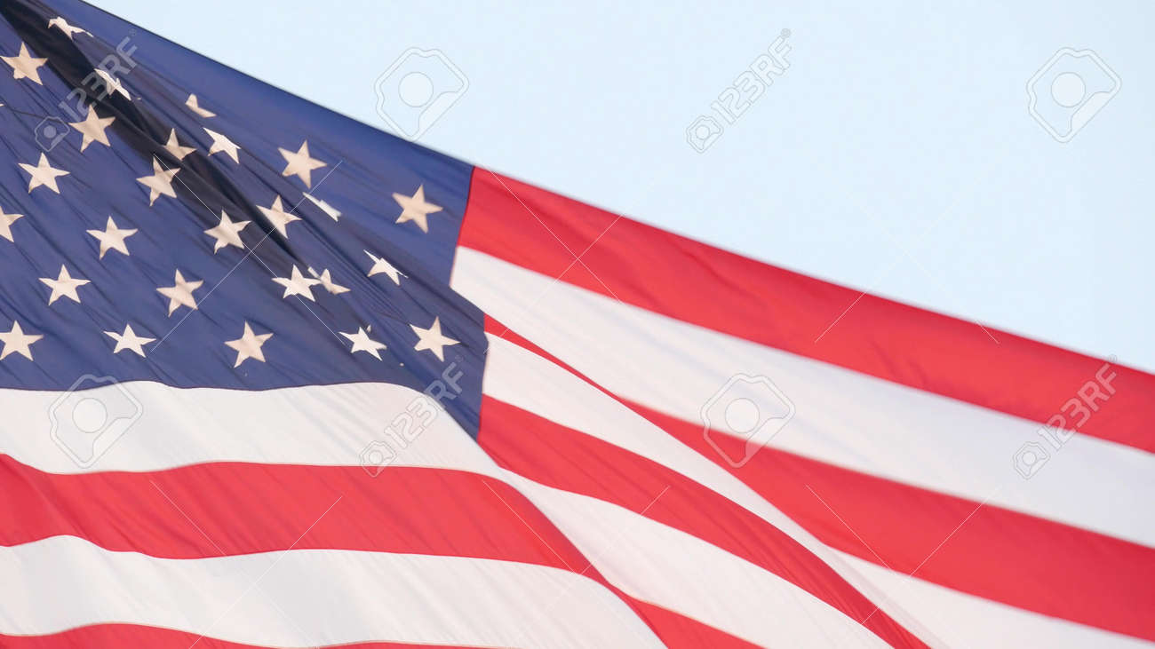 American Flag Waving In Wind, USA. National Symbol Waves In Breeze On  Flagpole. Real Old Glory Star Spangled Banner As Concept Of Independence,  Liberty, Democracy, Patriotism. Background For 4th July. Фотография,  картинки,