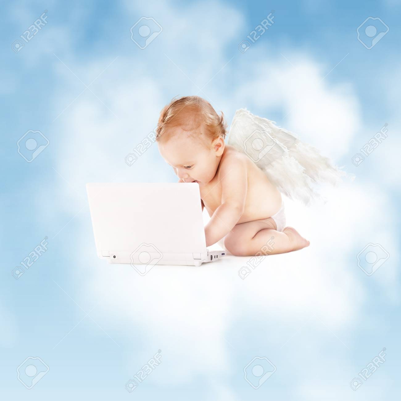 Picture Of Little Angel With Laptop Computer Stock Photo Picture And Royalty Free Image Image