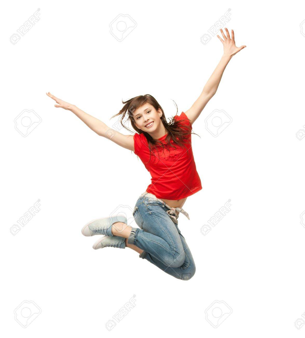 Picture Of Happy Girl Jumping In The Air Stock Photo, Picture and Royalty  Free Image. Image 19857119.