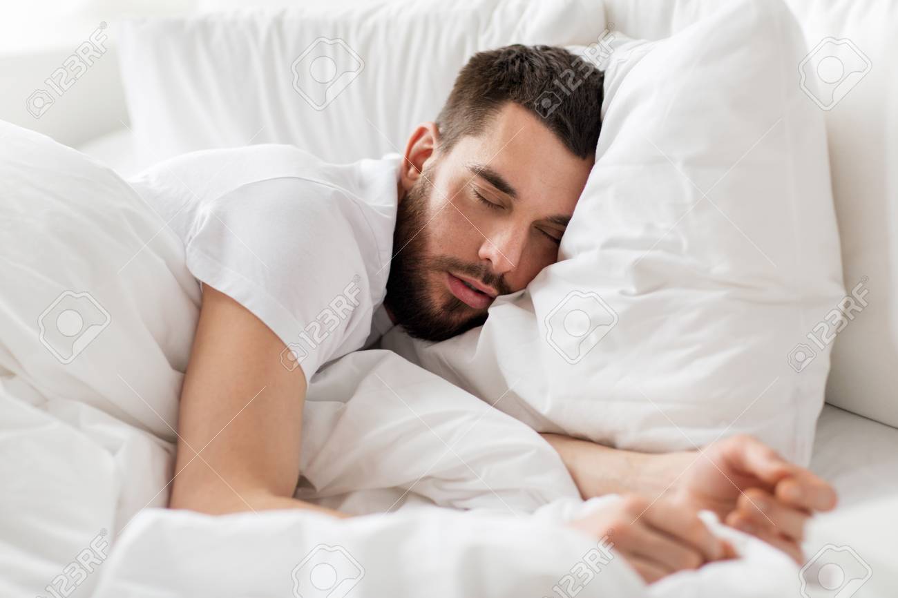 Rest Bedtime And People Concept Close Up Of Man Sleeping In Stock Photo Picture And Royalty Free Image Image