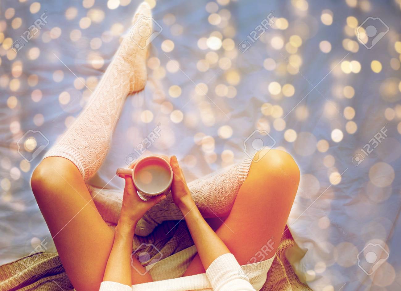 close up of woman with cocoa cup in bed at home - 89831487 close up of woman with cocoa cup in bed at home - 89831487