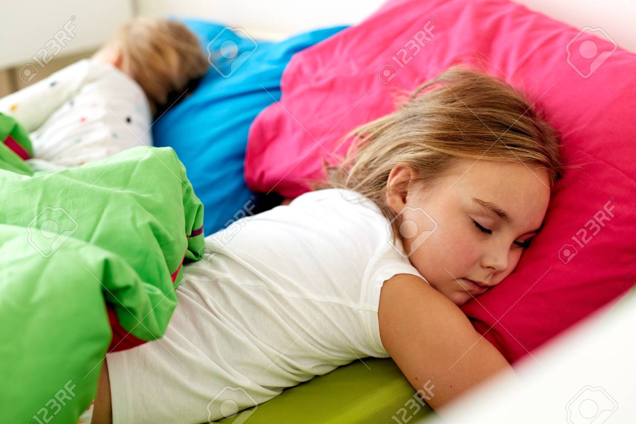 Little girls sleeping Little Girls Sleeping In Bed At Home Stock Photo, Picture and Royalty Free  Image. Image 95485289.