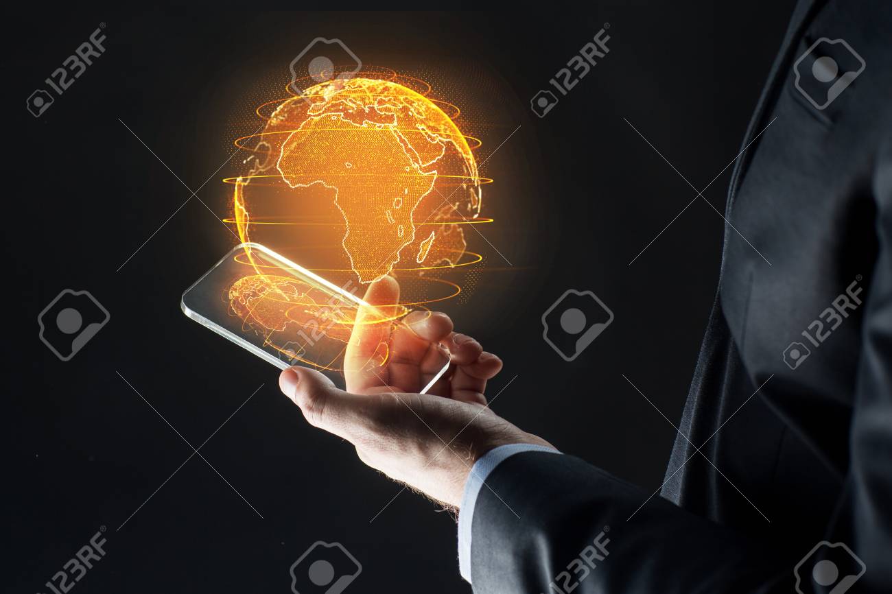 hand with smartphone and earth hologram - 101468820 hand with smartphone and earth hologram - 101468820