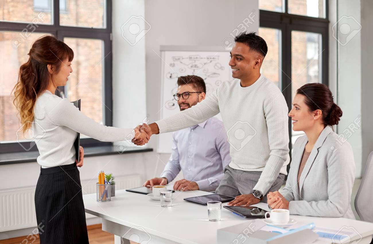 Recruiters having job interview with employee - 121996664 Recruiters having job interview with employee - 121996664