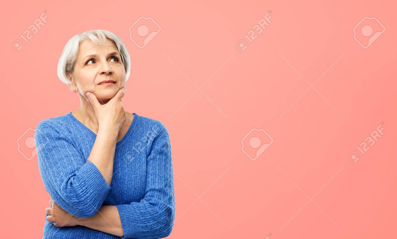 portrait of senior woman in blue sweater thinking - 124766688 portrait of senior woman in blue sweater thinking - 124766688