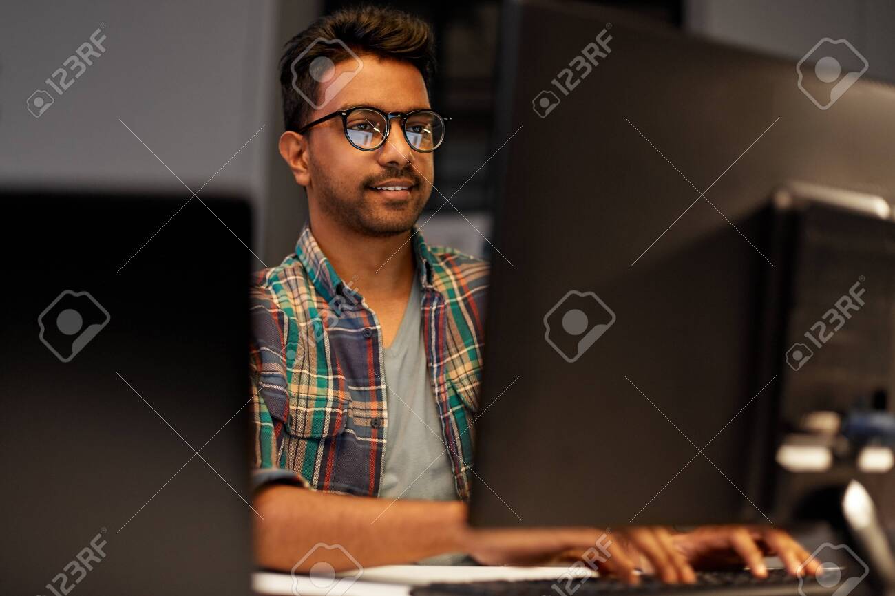 close up of creative man working at night office - 124311305 close up of creative man working at night office - 124311305