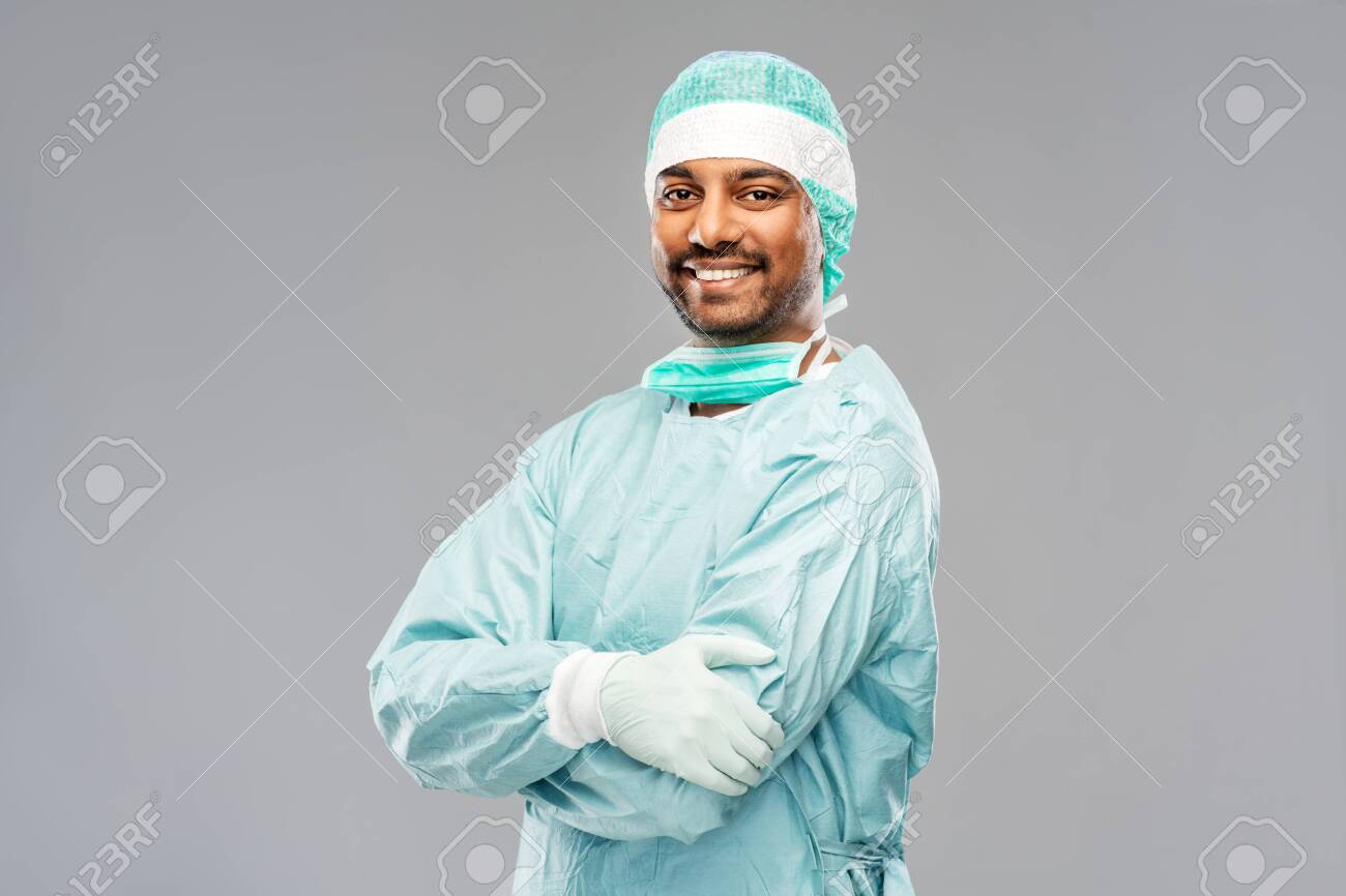 indian male doctor or surgeon in protective wear - 130496112 indian male doctor or surgeon in protective wear - 130496112