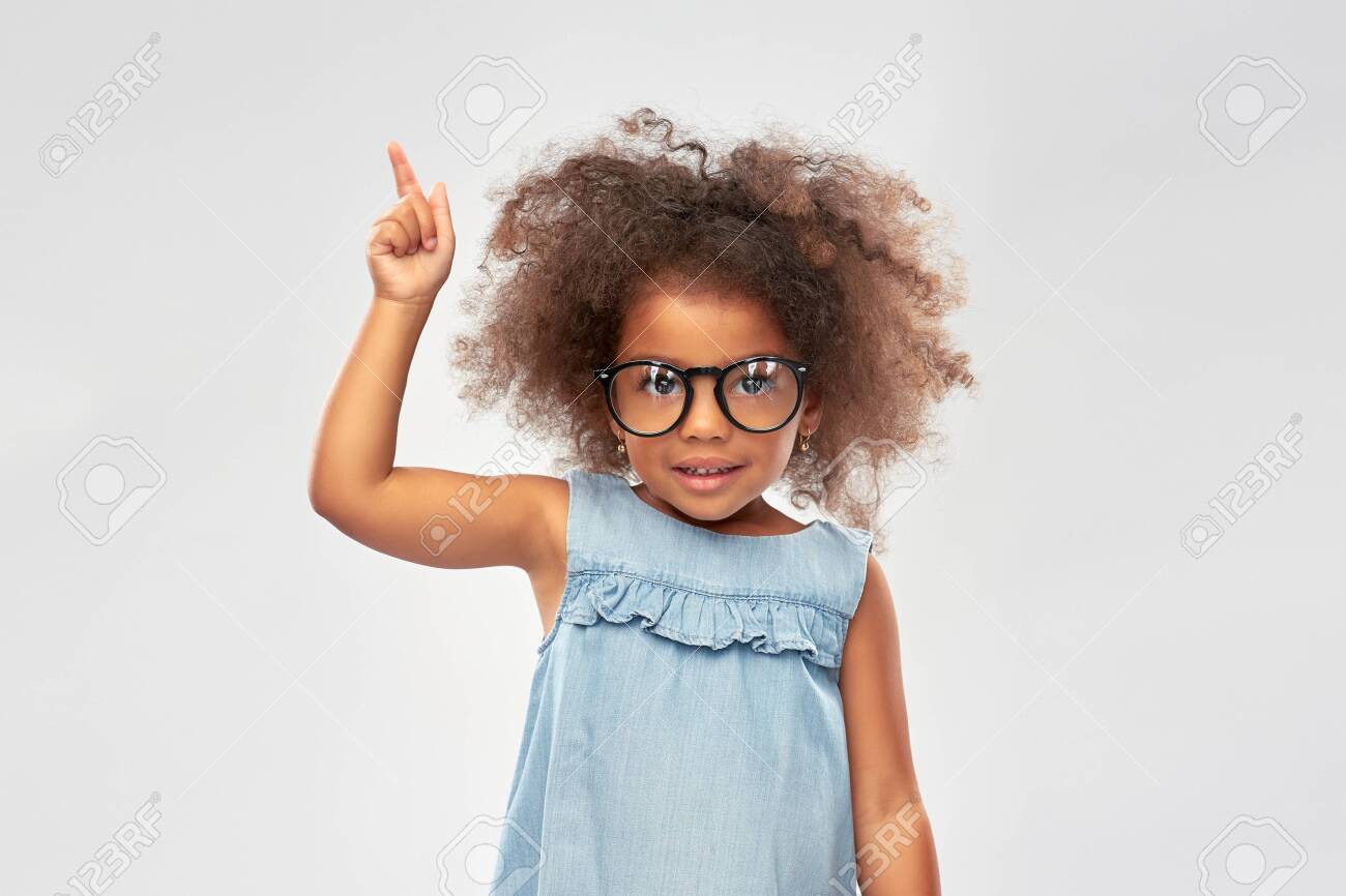 happy little african american girl in glasses - 132027104 happy little african american girl in glasses - 132027104