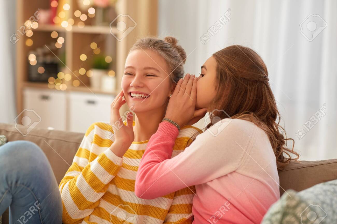 Happy Teenage Girls Gossiping At Home Stock Photo Picture And Royalty Free Image Image