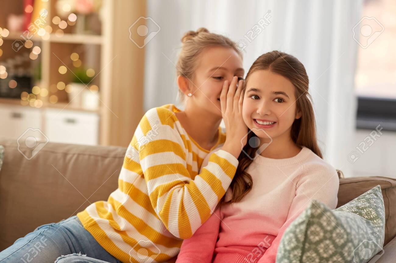 Happy Teenage Girls Gossiping At Home Stock Photo Picture And Royalty Free Image Image