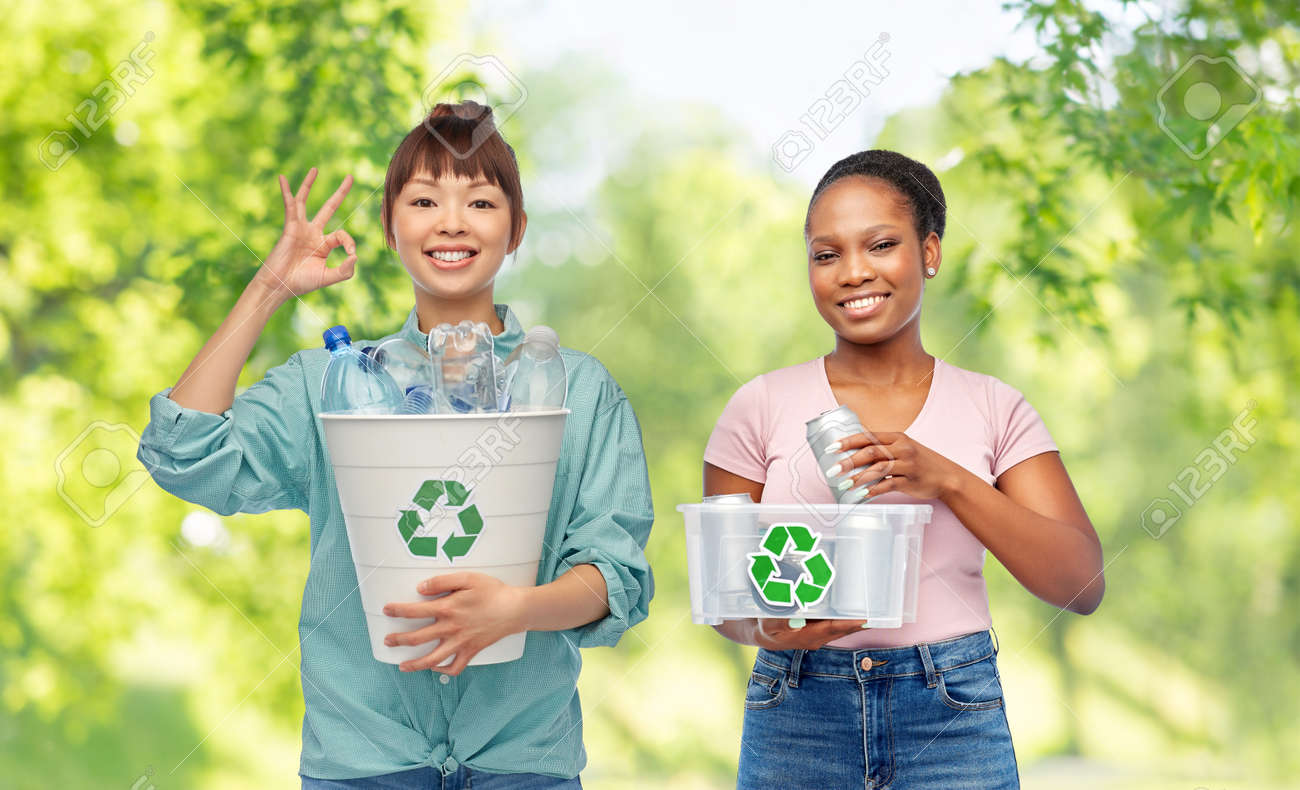 happy women sorting plastic and metallic waste - 169910282 happy women sorting plastic and metallic waste - 169910282