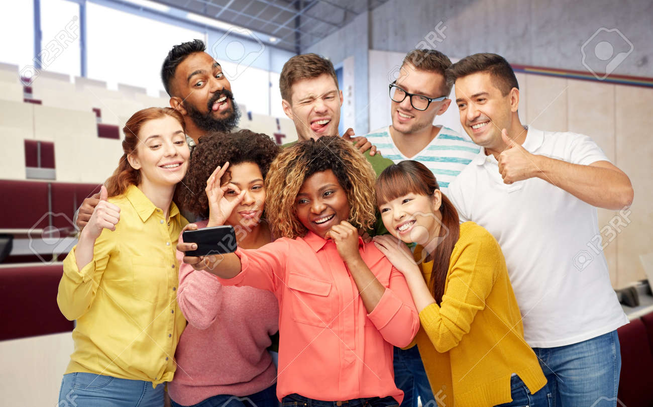 international students and teacher taking selfie - 169910289 international students and teacher taking selfie - 169910289