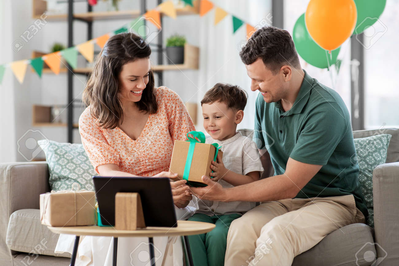 happy family giving present to little son at home - 169968141 happy family giving present to little son at home - 169968141