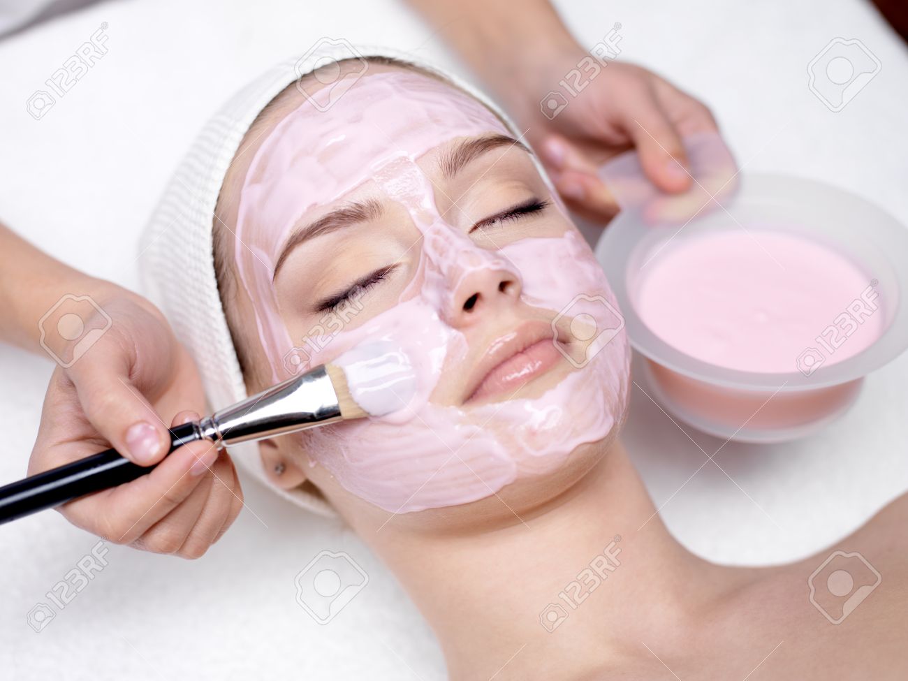 Download Young Beautiful Girl Receiving Pink Facial Mask In Spa Beauty Stock Photo Picture And Royalty Free Image Image 9244707 PSD Mockup Templates