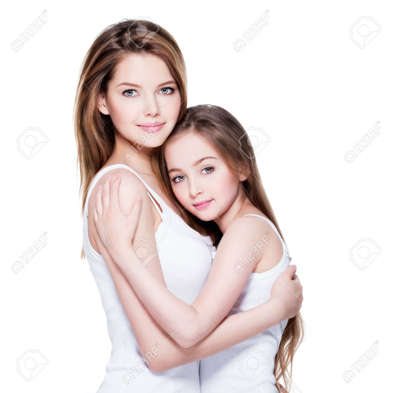 mother little daughter Beautiful Young Mother With A Small Daughter 8 Years Embrace Each Other At  Studio Stock Photo, Picture and Royalty Free Image. Image 53559669.