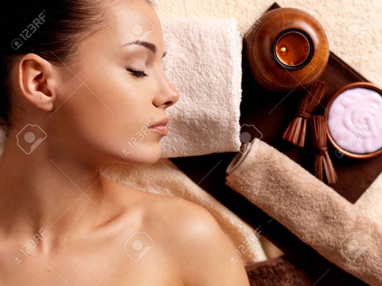 Calm woman after massage relaxing in spa salon. Beauty treatment concept. - 62833667 Calm woman after massage relaxing in spa salon. Beauty treatment concept. - 62833667