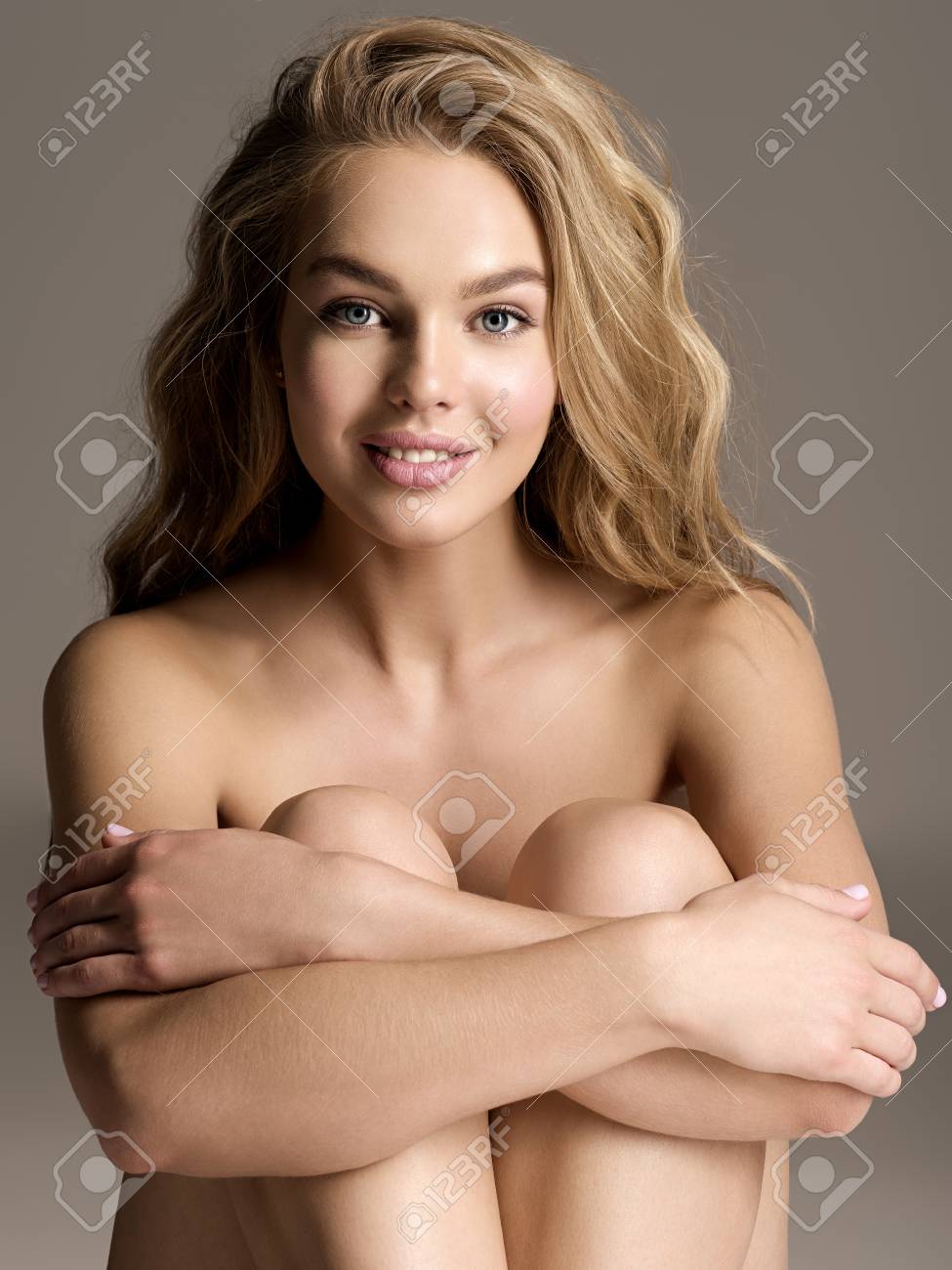 Nude woman smile