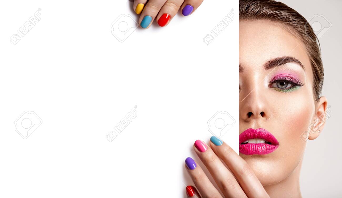 Beautiful woman with a colored manicure holds blank poster. Attractive white girl with empty billboard. Glamour fashion model's holding placard, free space. Fashionable advertisment concept. Art - 122677243 Beautiful woman with a colored manicure holds blank poster. Attractive white girl with empty billboard. Glamour fashion model's holding placard, free space. Fashionable advertisment concept. Art - 122677243