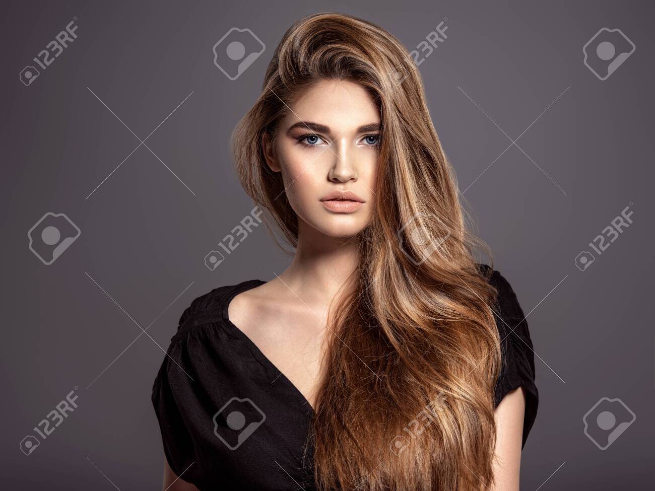 Woman With Beauty Long Brown Hair Beautiful Face Of An Attractive Stock Photo Picture And Royalty Free Image Image 129600517
