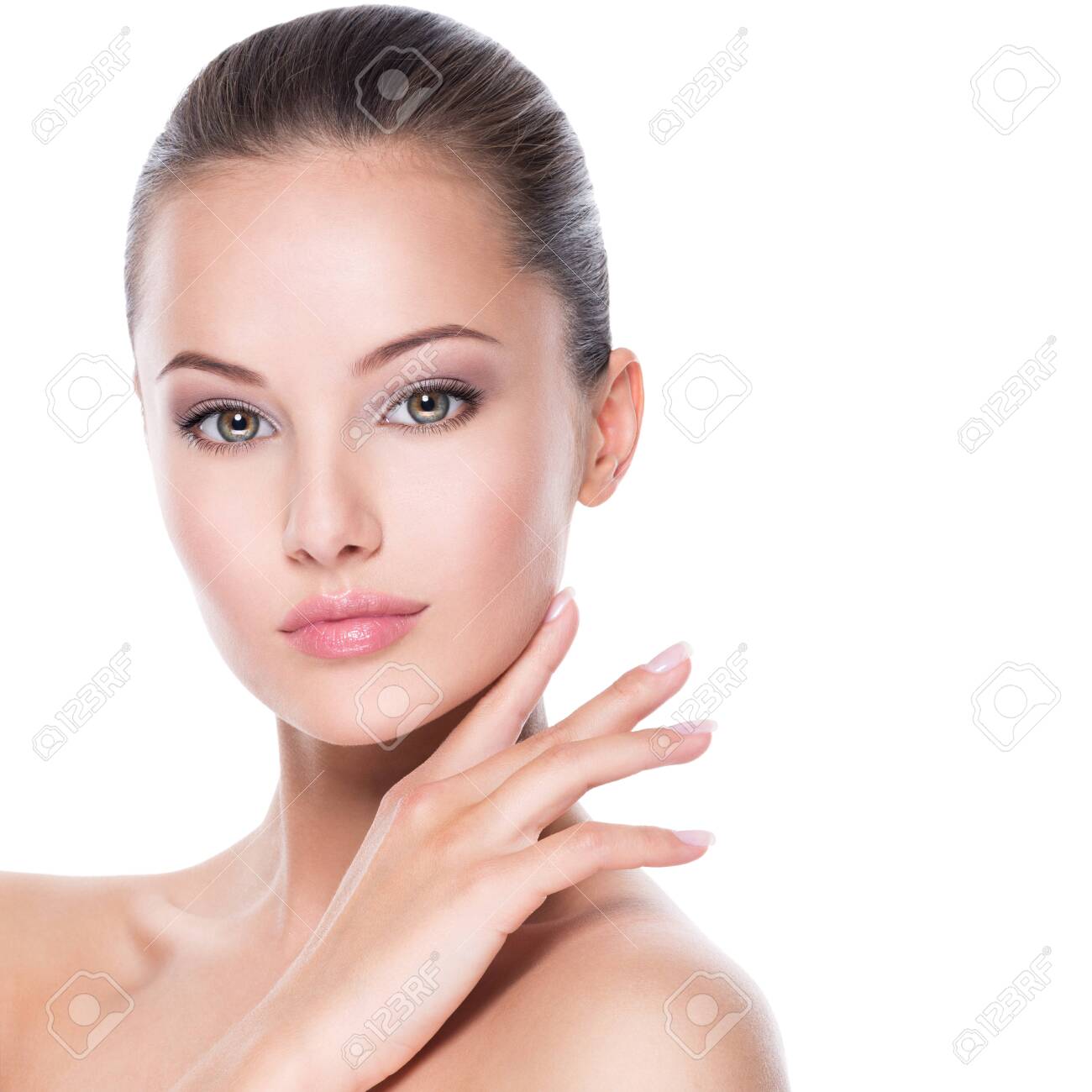 Closeup portrait of young beautiful woman with hands at face - isolated on white background - 136668069 Closeup portrait of young beautiful woman with hands at face - isolated on white background - 136668069