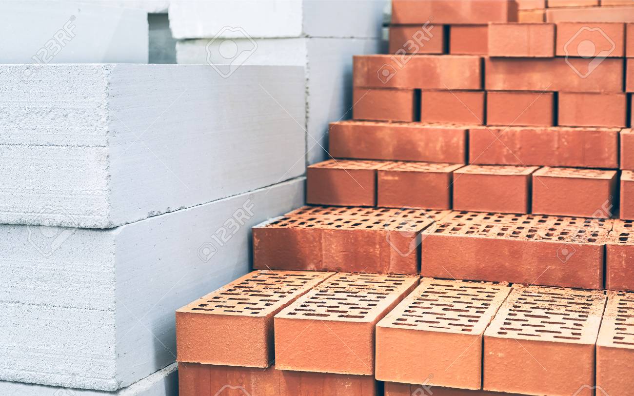 Bricks And Aerated Concrete Blocks. White Lightweight Concrete Block. Red  Brick. Building Material Stock Photo, Picture and Royalty Free Image. Image  118122919., image size:1300x812