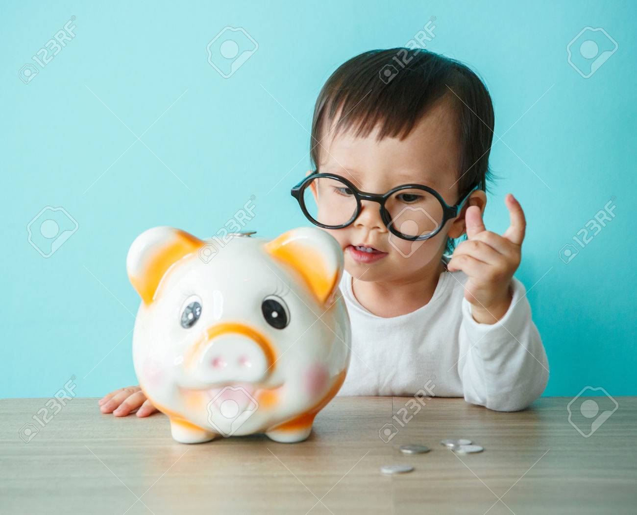 kids saving piggy bank saving money little baby moneybox putting coin into piggy bank kid saving money for future little baby moneybox putting coin into piggy bank kid saving kids saving piggy bank saving money little baby moneybox putting coin into piggy bank kid saving money for future little baby moneybox putting coin into piggy bank kid saving