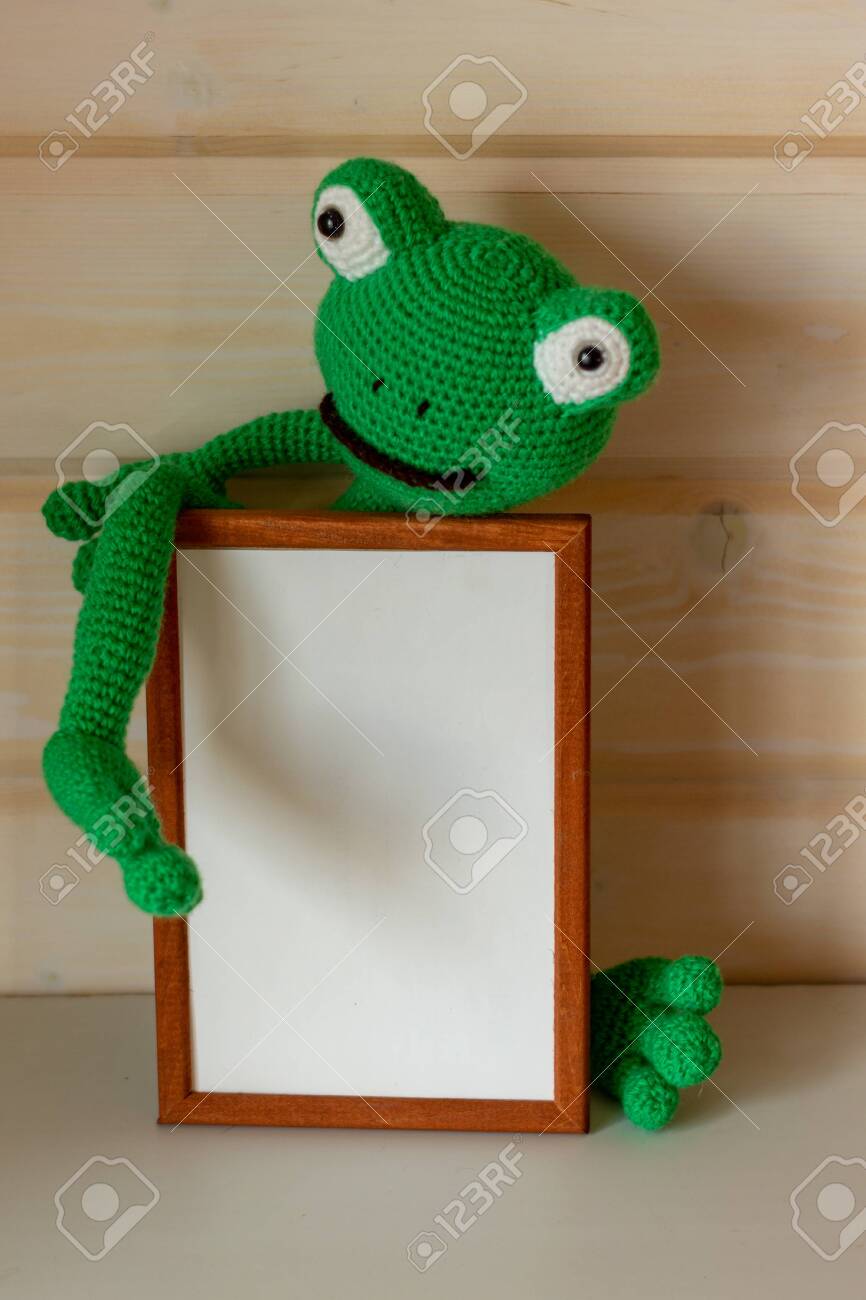 green frog doll
