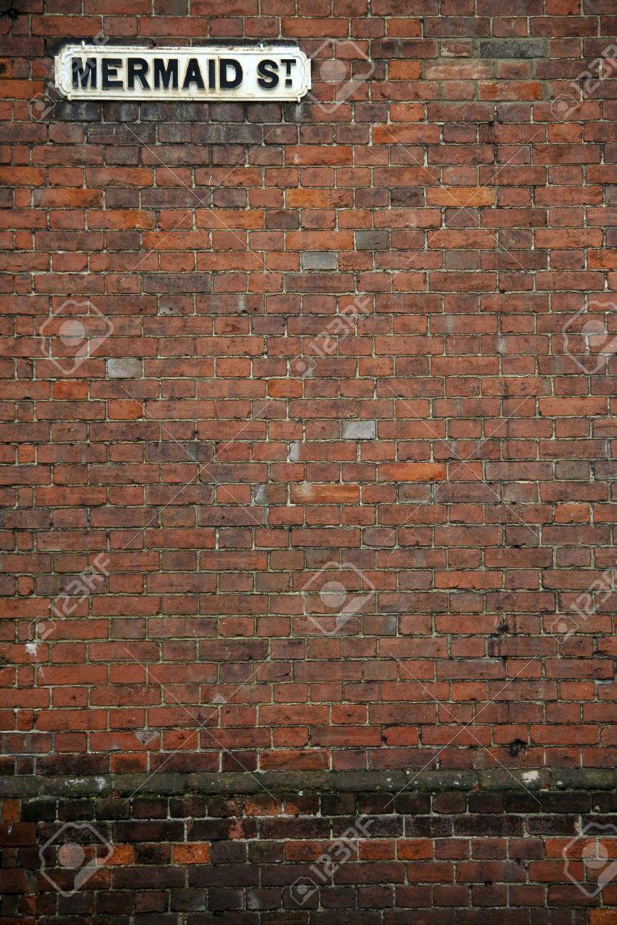 Vintage Sign On Old Brick Wall In Historic Rye In Sussex For Stock