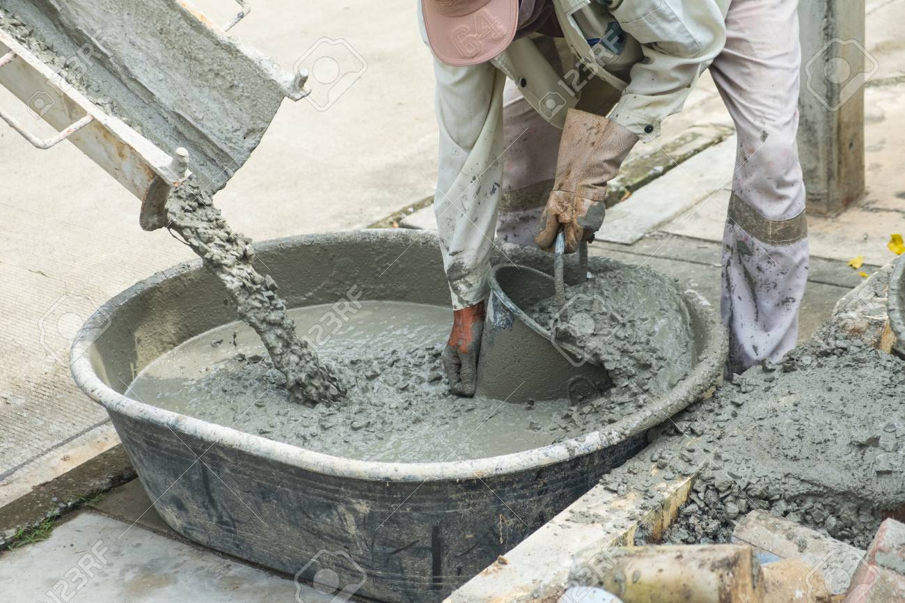 Builders Are Pouring Ready Mixed Concrete Pouring Concrete Into The Construction Of The House Stock Photo Picture And Royalty Free Image Image 114338465
