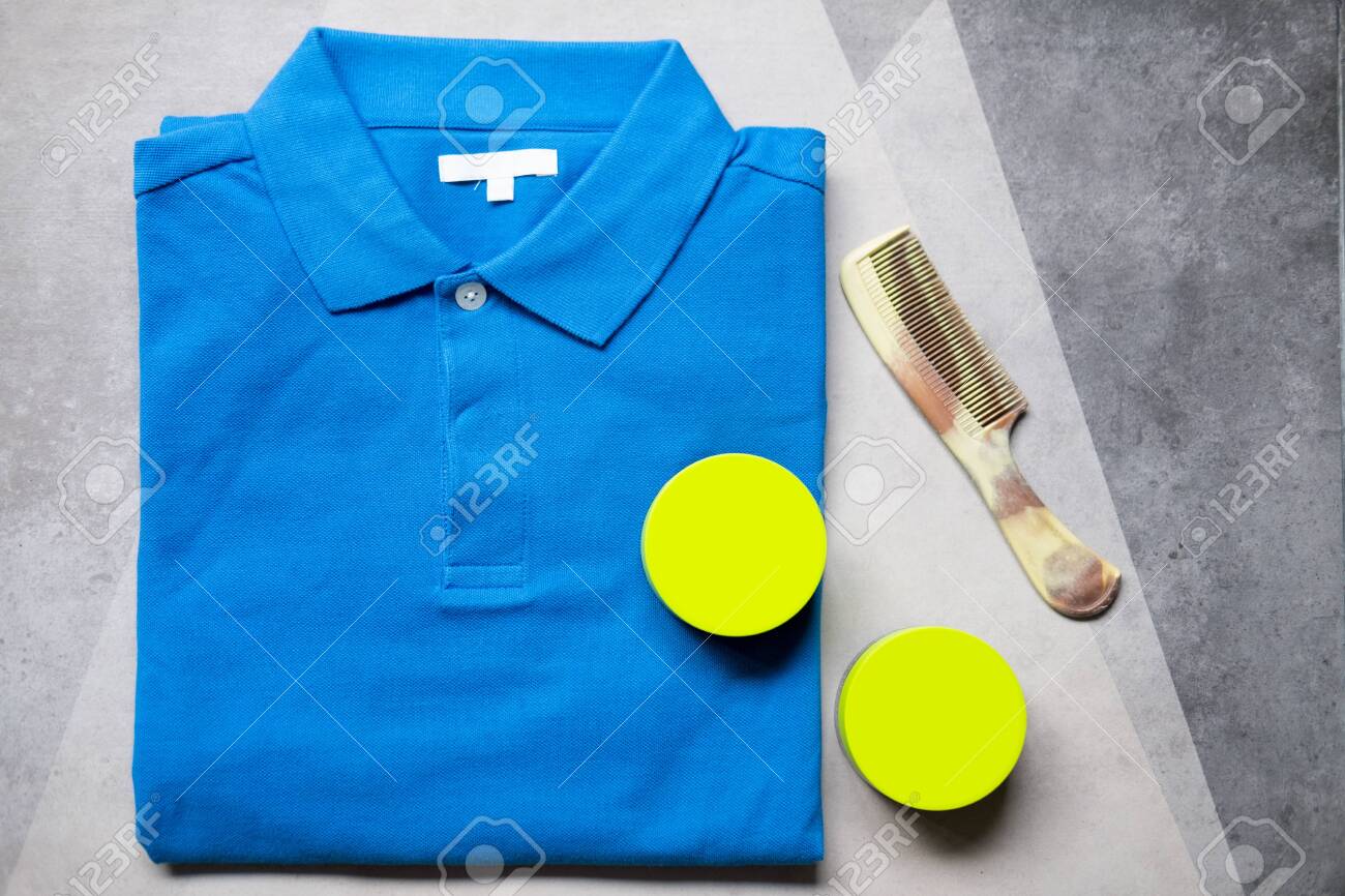 Two Of Hair Wax And Comb With Blue Shirt Stock Photo Picture And