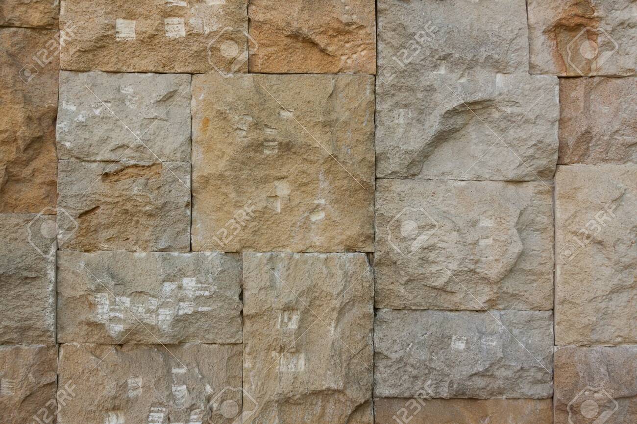 Chipped Stone Wall Background extreme closeup - 123709715 Chipped Stone Wall Background extreme closeup - 123709715