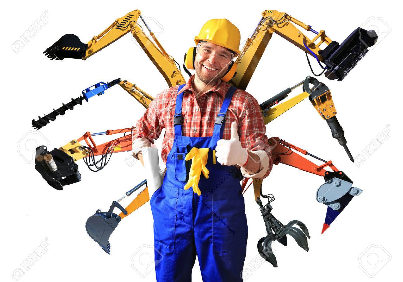 Construction worker in yellow helmet and parts of construction machinery - 50406308 Construction worker in yellow helmet and parts of construction machinery - 50406308