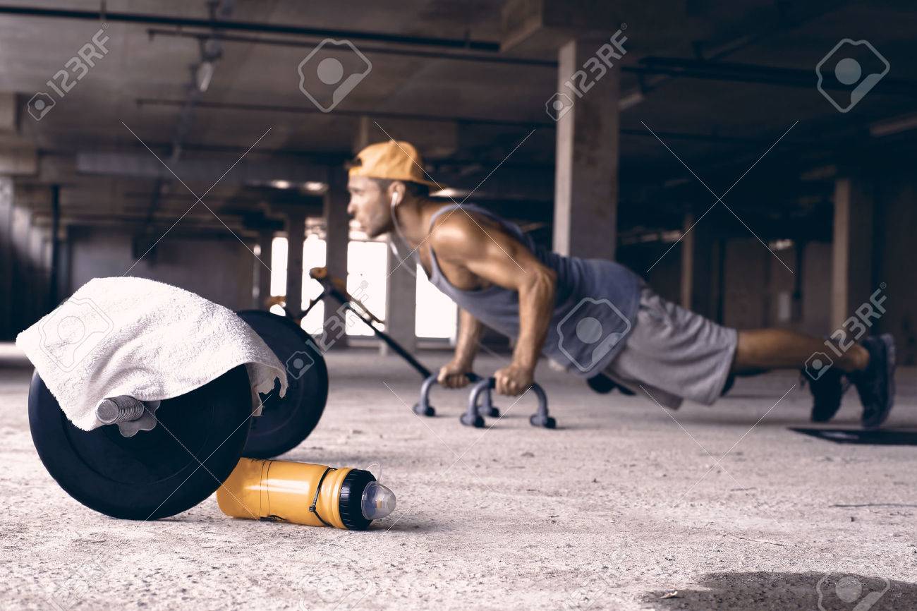 Guy in the baseball cap in the gym - 59360125 Guy in the baseball cap in the gym - 59360125