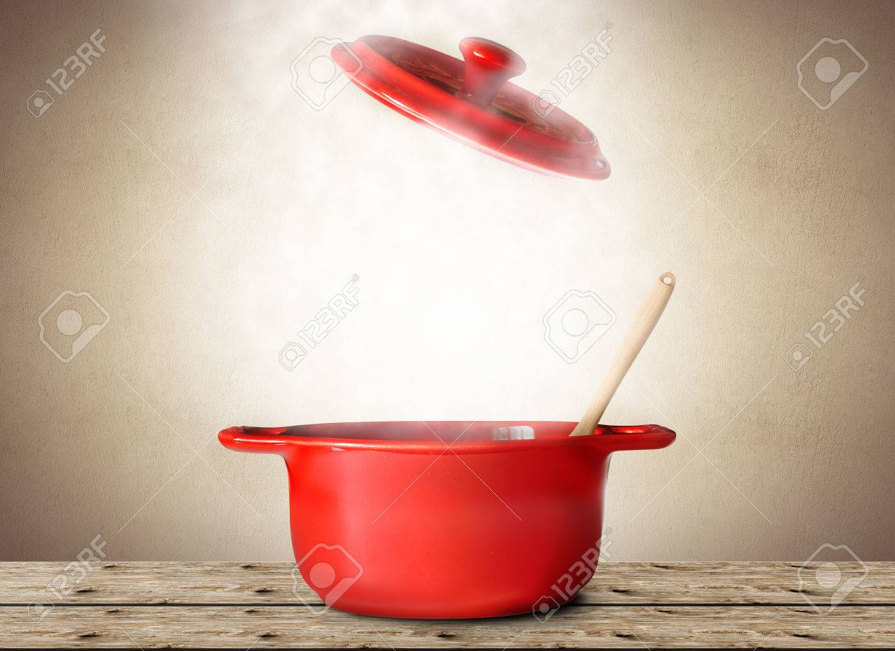 Big red pot for soup with spoon and fork - 65746222 Big red pot for soup with spoon and fork - 65746222