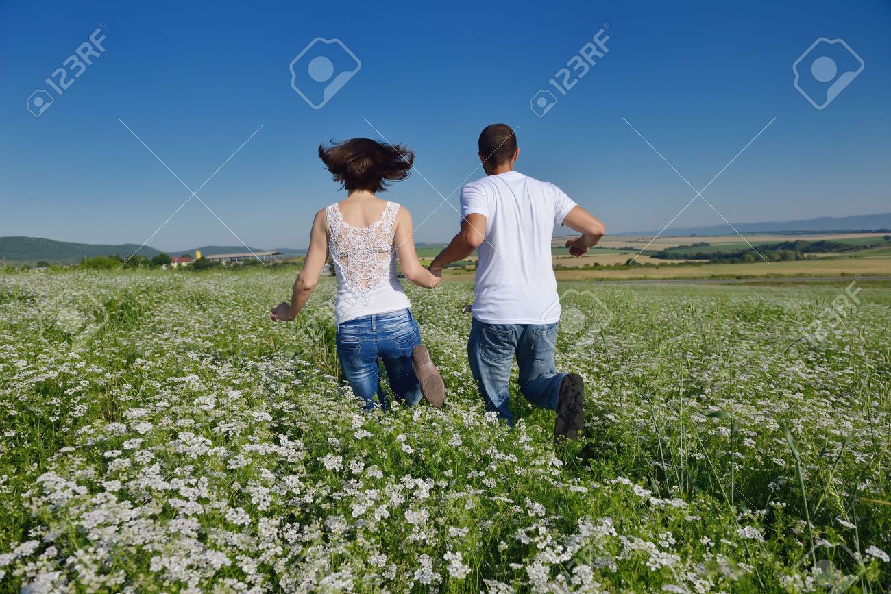 https://previews.123rf.com/images/dotshock/dotshock1209/dotshock120901330/15516884-happy-young-couple-in-love-have-romance-and-fun-at-wheat-field-in-summer-Stock-Photo.jpg