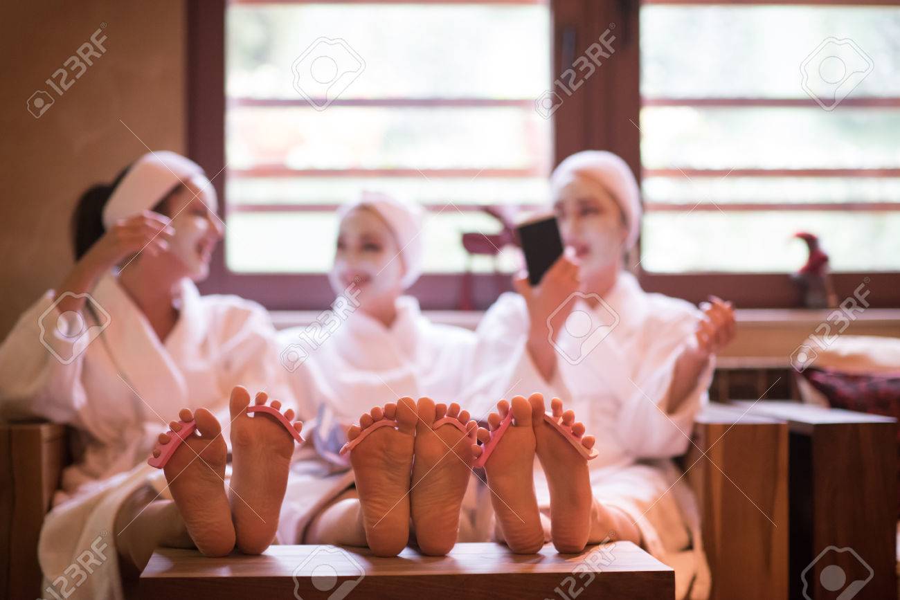group of famale friends in spa have fun, celebrate bachelorette party with face mask - 73377615 group of famale friends in spa have fun, celebrate bachelorette party with face mask - 73377615