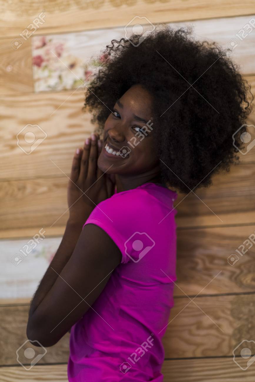 Portrait Of Cute African American Woman With Afro Hairstyle While