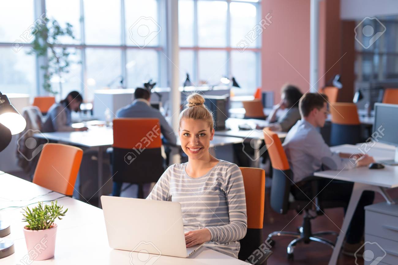 Young female Entrepreneur Freelancer Working Using A Laptop In Coworking space - 82769066 Young female Entrepreneur Freelancer Working Using A Laptop In Coworking space - 82769066