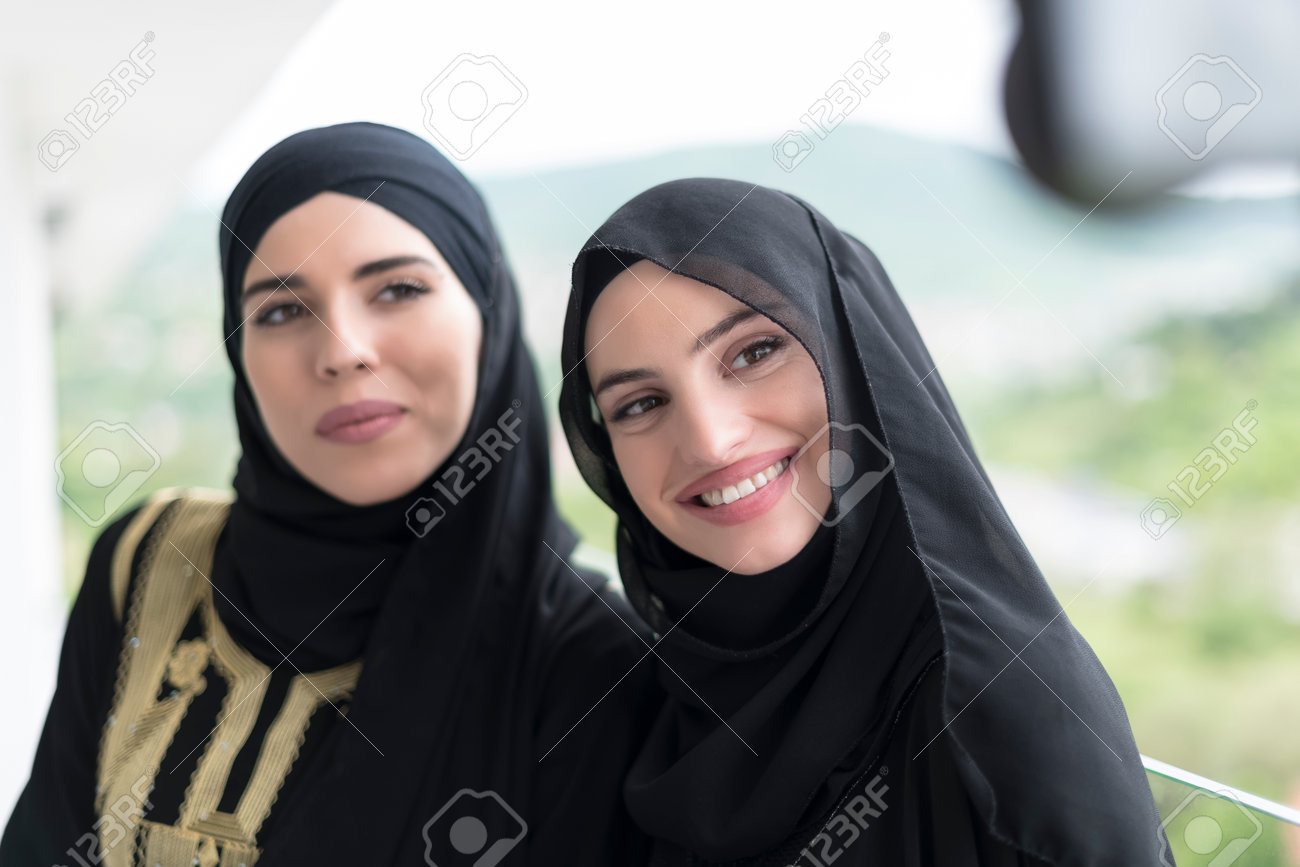 Premium Vector  Young muslim woman wearing hijab taking selfie