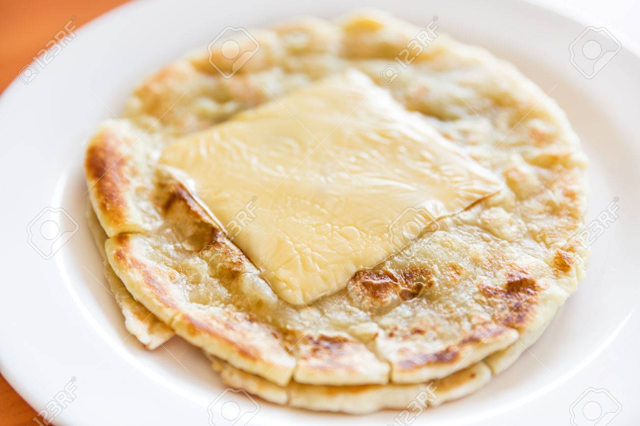 Roti With Cheese On White Plate Roti Prata Stock Photo Picture And Royalty Free Image Image 40787230