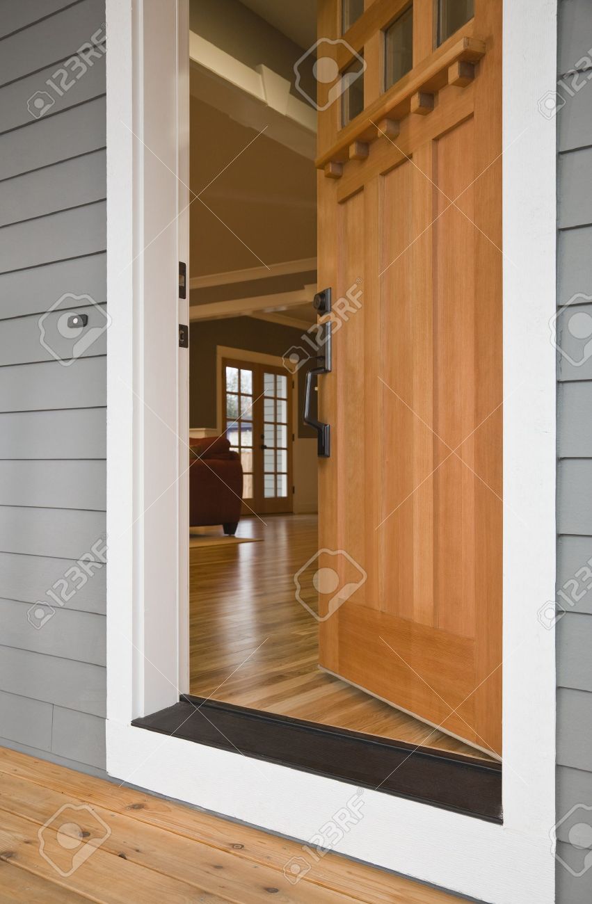 Open Front Door Welcome exterior view of the open front door to a residence with the Open Front Door Welcome exterior view of the open front door to a residence with the