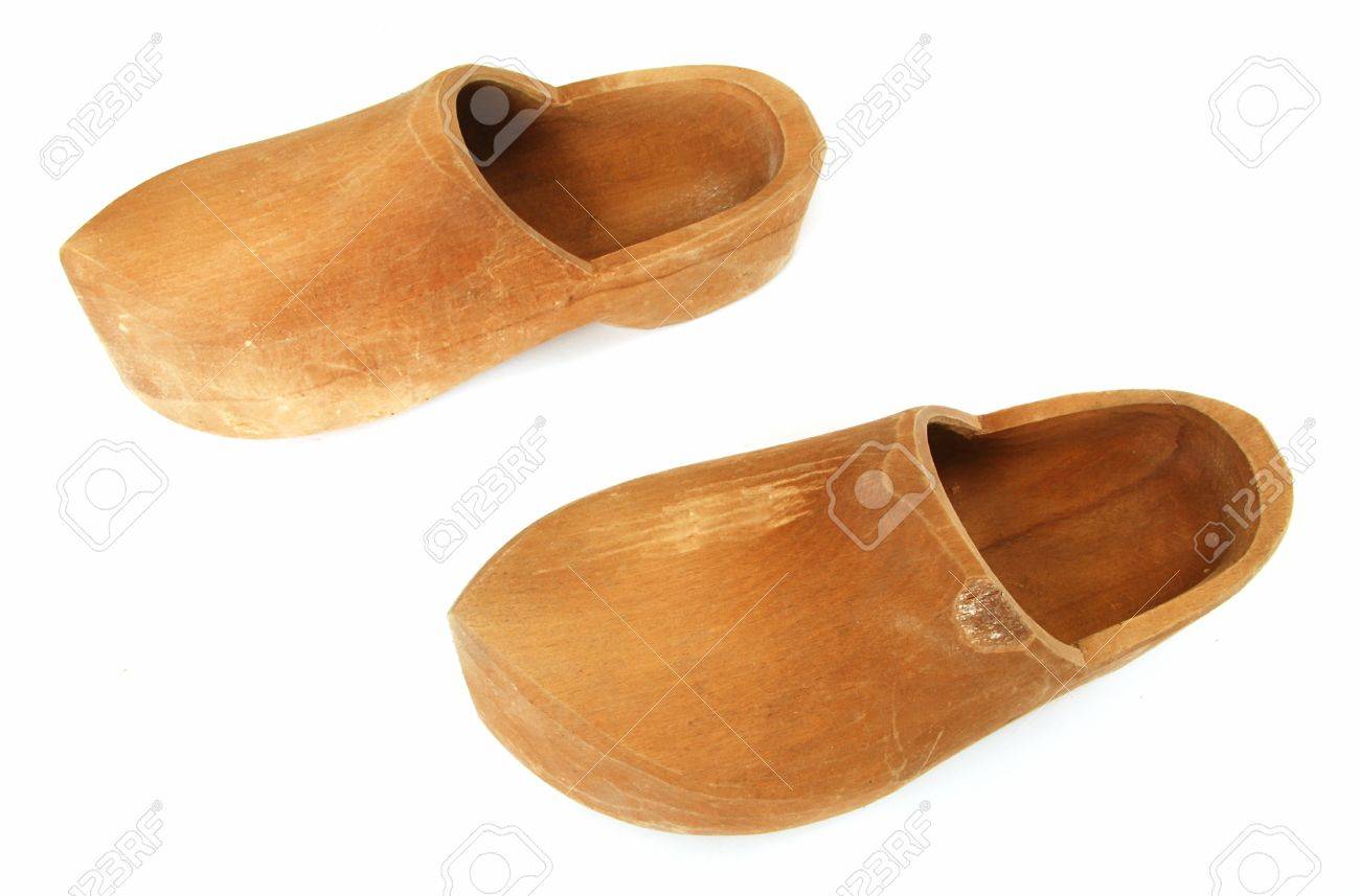white wooden clogs
