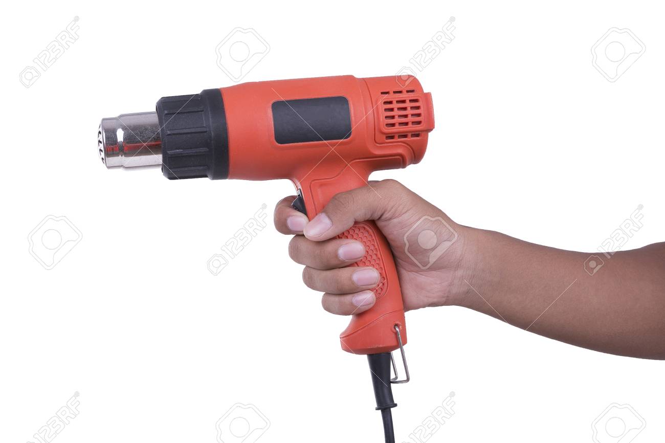 Hand Hold Hot Air Blower On White Background Stock Photo Picture And Royalty Free Image Image