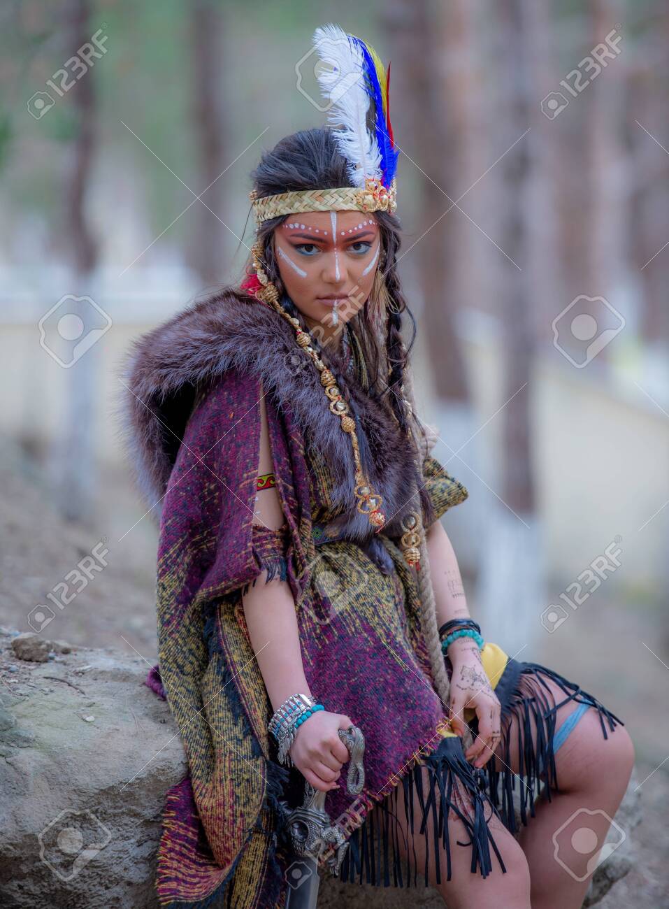Native American Indian Woman Portrait Outdoors,portrait Of Shamanic Female  With Indian Feather Hat And Colorful Makeup, Stock Photo, Picture and  Royalty Free Image. Image 147989280., image size:957x1300