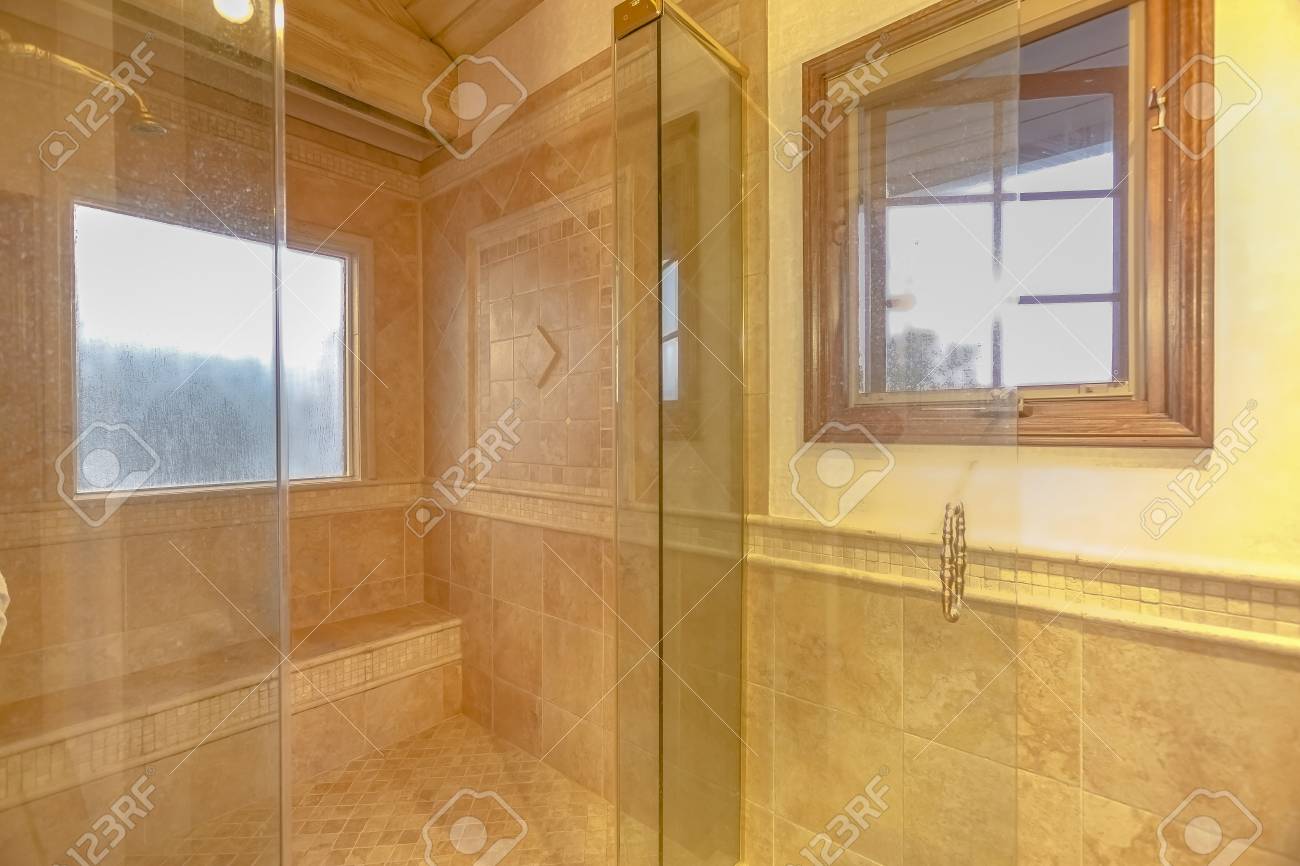 Spacious Bathroom In Gray Tones With Heated Floors And Walk In