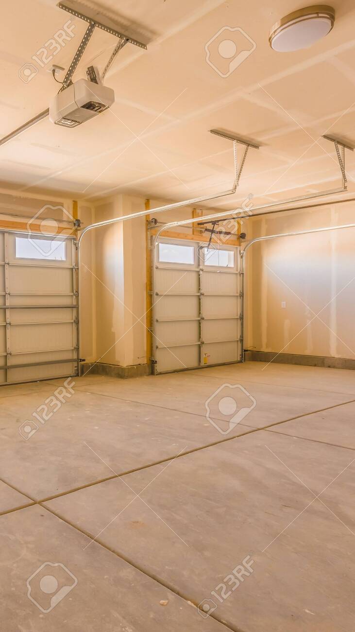 Vertical Frame Interior Of An Unfinished Garage With Unpainted
