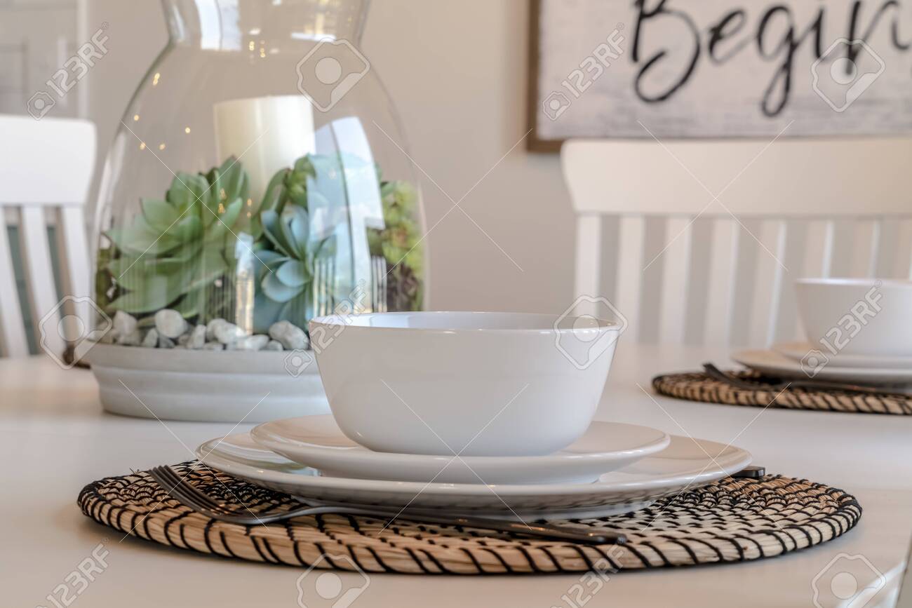 Dining Tableware And Round Placemat Against Candle And Plant Stock Photo Picture And Royalty Free Image Image 139153184