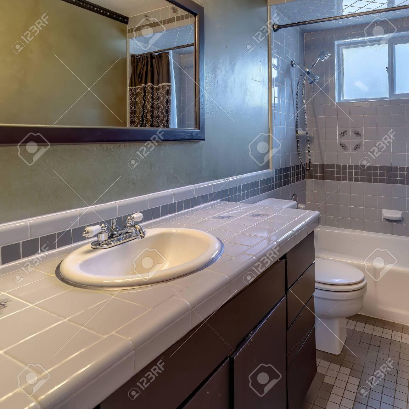 Square Frame Tiled Bathroom Interior Of Home With Vanity Area Stock Photo Picture And Royalty Free Image Image 149182131
