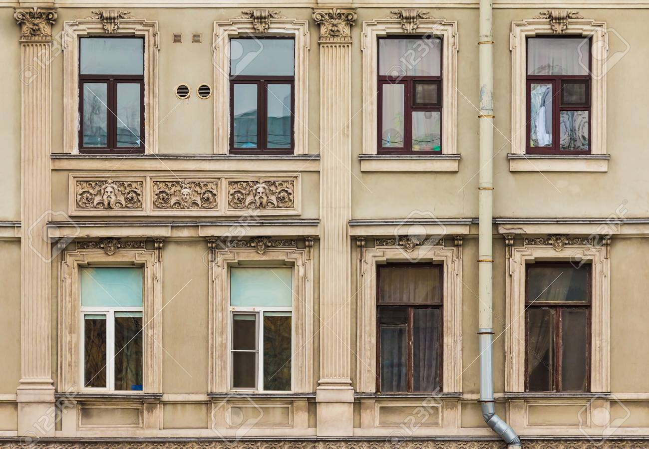 Several Windows In A Row And Balcony On Facade Of Urban Apartment Building  Front View, St. Petersburg, Russia Stock Photo, Picture And Royalty Free  Image. Image 87181867.